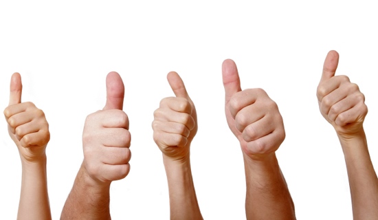 Five hands showing thumbs up